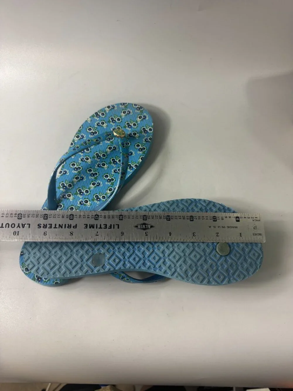 Tory Burch All Over Print Flip Flops in Blue
